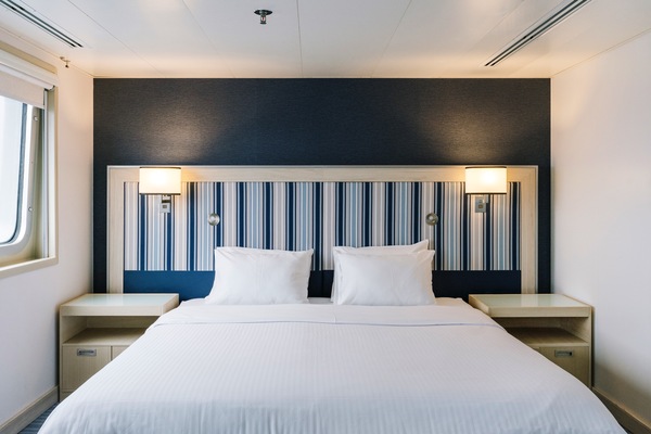 HX Hurtigruten Expeditions, Santa Cruz II, Darwin Suite, Credit - Clara Tuma 3.JPG